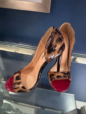 Leopard Print Open-Toe High Heels with Red Patent Accent

Brand new